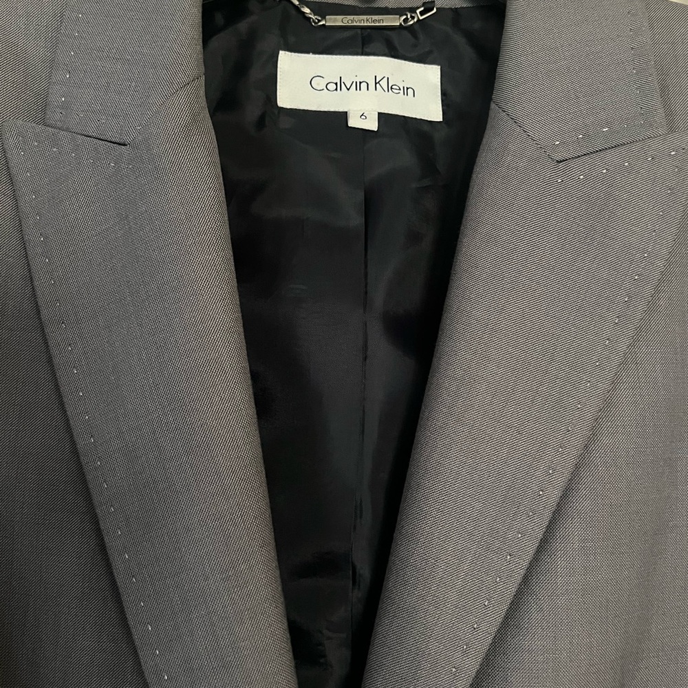 Gently worn. Two piece, women’s pant suit.